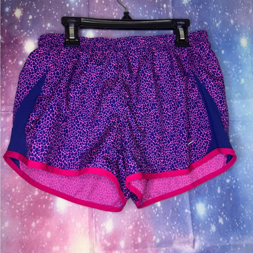 Nike Dri-FIT running shorts with a purple and pink animal print design 🛍